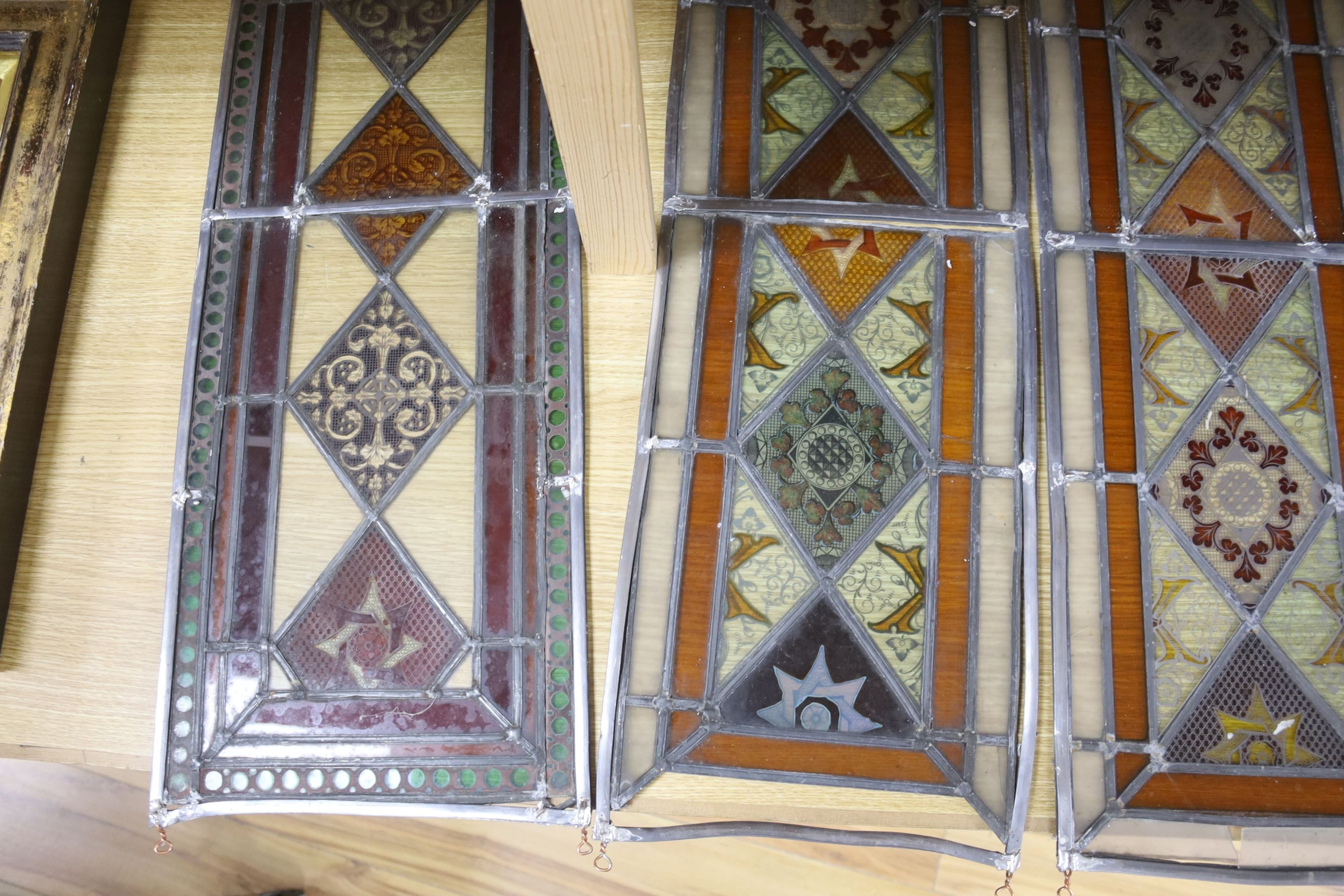 Four late 19th century stained and lead glass panels, 81 x 27cm